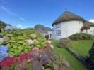 Stråtækt sommerhus i den maleriske Cornwall-landsby Veryan til salg
